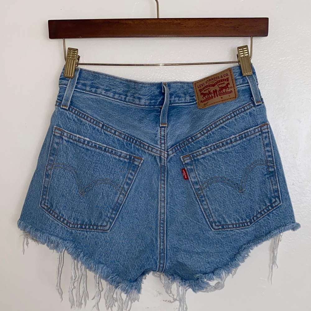 Levi's Distressed Light Blue Denim Cutoff Shorts - Picture 2 of 4